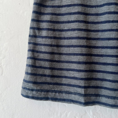 Close-up of a gray and black striped fabric on a white background
