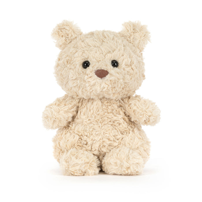 Jellycat Bartholomew Bear Junior seated front-facing, showing fuller curly cream fur, black bead eyes, and brown nose on a white background