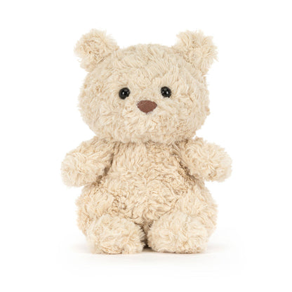 Jellycat Bartholomew Bear Junior seated front-facing, showing fuller curly cream fur, black bead eyes, and brown nose on a white background
