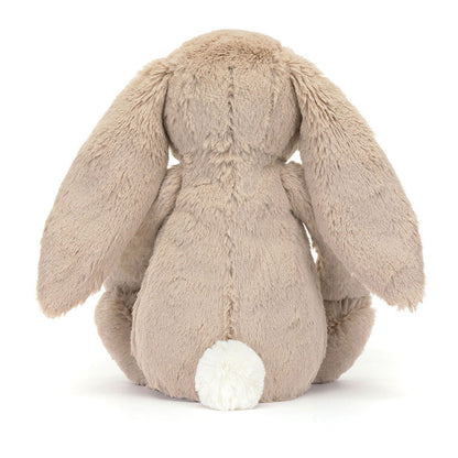Jellycat Blossom Beige Bunny 'Petal' Original — rear view showing the beige textured fur, wide floppy ears, and small white cotton tail, on a white background