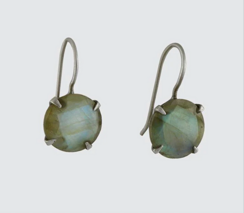 A pair of classic faceted stone drop earrings in silver color with greenish-blue hues.