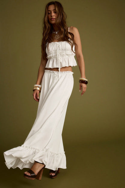 Detail shot of the Dahlia White Satin Maxi Skirt highlighting the satin elements.