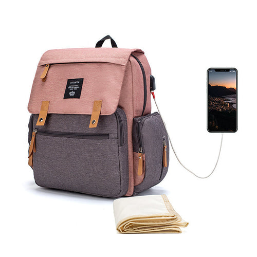 Lequeen diaper bag with shoulder and crossbody carry, roomy storage and pockets for baby essentials during trips and travels.