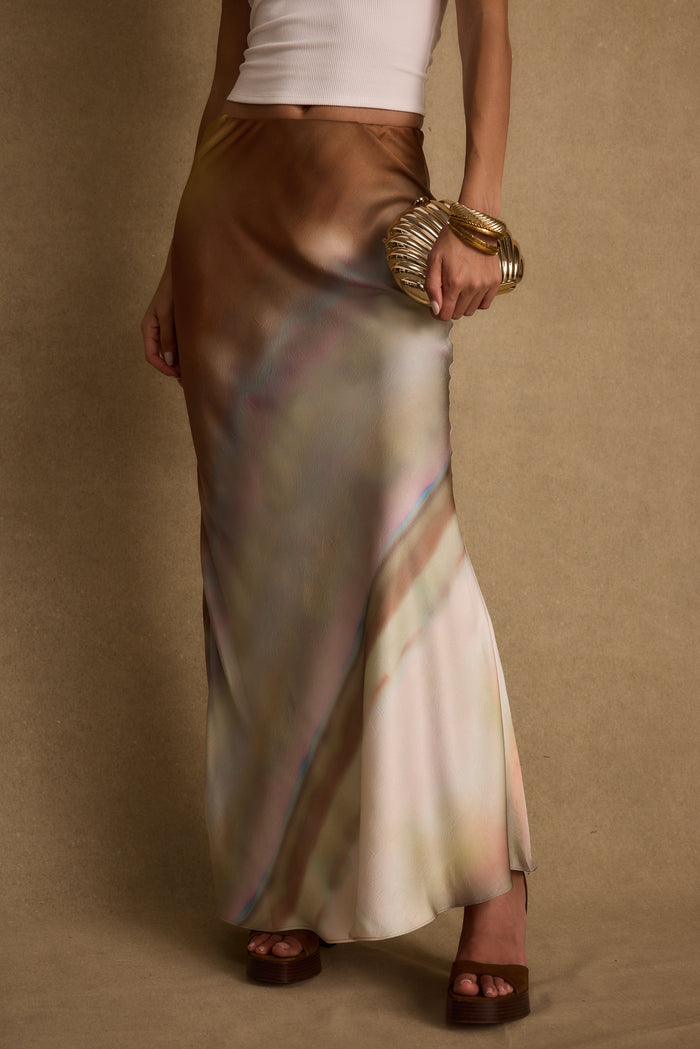 Back view of the satin maxi skirt showing the silhouette and fit.
