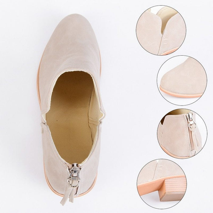 Beige shoe with zippers and close-up details on a white background