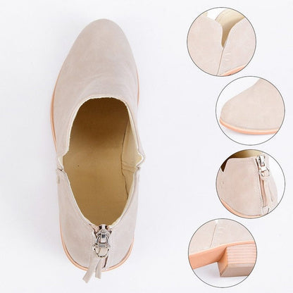 Beige shoe with zippers and close-up details on a white background