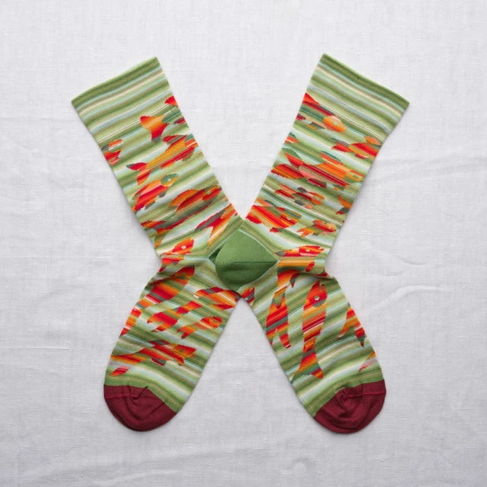Colorful striped socks on a light gray background
