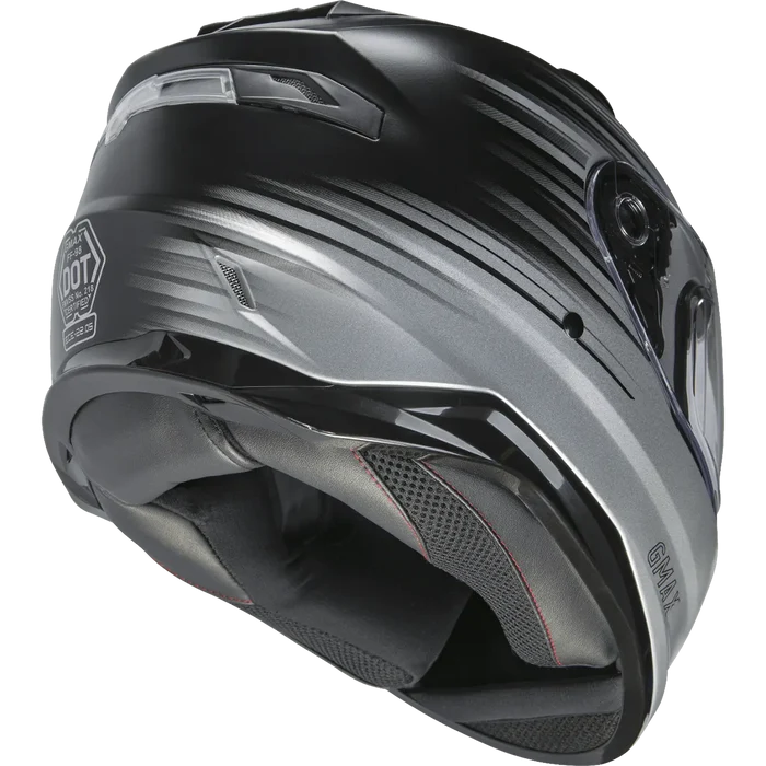 Bottom rear angle of GMAX full-face motorcycle helmet in black and silver gradient showing rear vents, padded neck roll, and DOT certification.