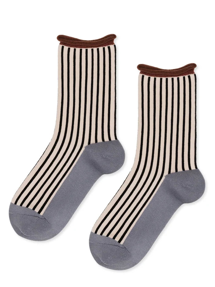 Hilda Crew socks in Pebble — black and white vertical stripe with brown rolled cuff and grey heel and toe, flat lay product shot on white background