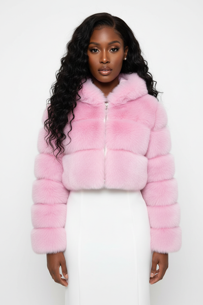 Women's short faux fur coat with hood layered over a knit top to show its regular fit and easy movement for daily wear today.