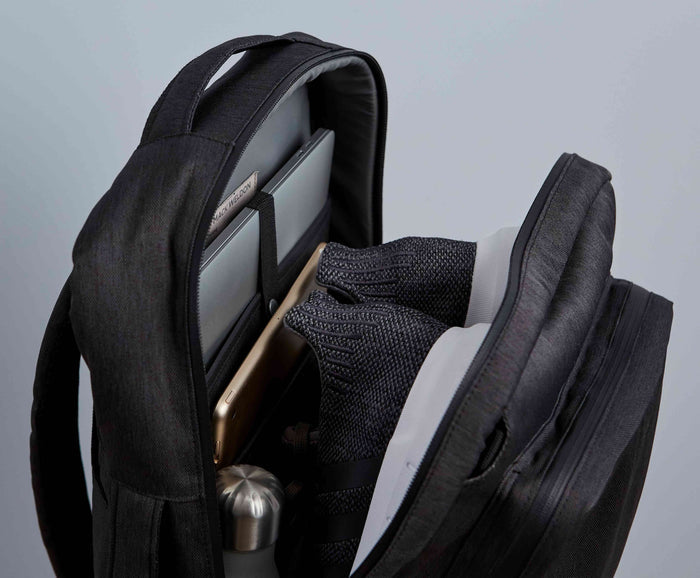 Inside view of Ion Convertible Backpack packed with shoes and laptop