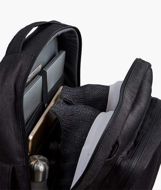 hover | Inside view of Ion Convertible Backpack packed with shoes and laptop