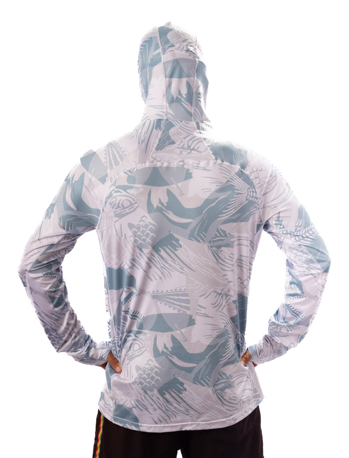 Back view of a man wearing the Waihana Island Sky Fishbone Sun Shirt with the built-in hood and face mask pulled up, showcasing the all-over fish print pattern on a white background.