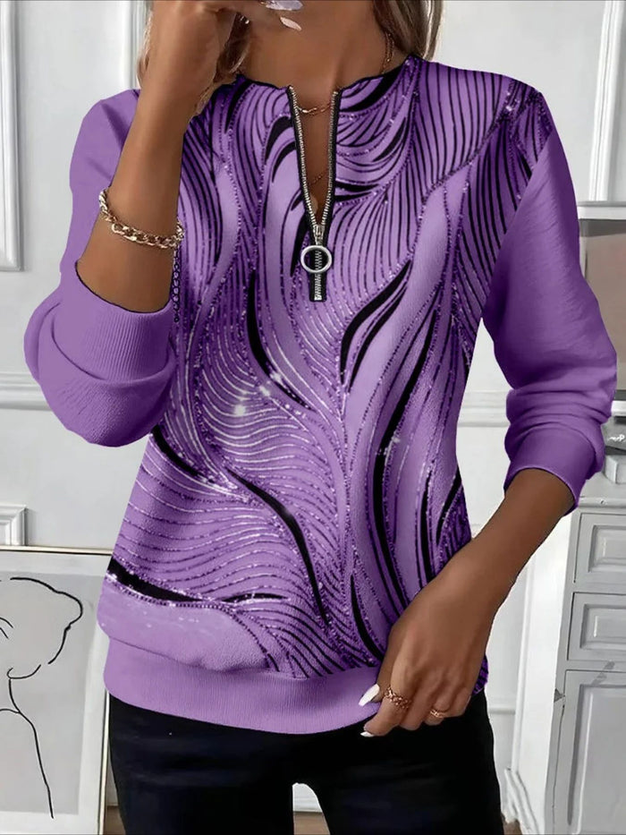 Christmas print women's sweatshirt with long sleeves, loose fit and mid-length styling presented for festive outfit planning.