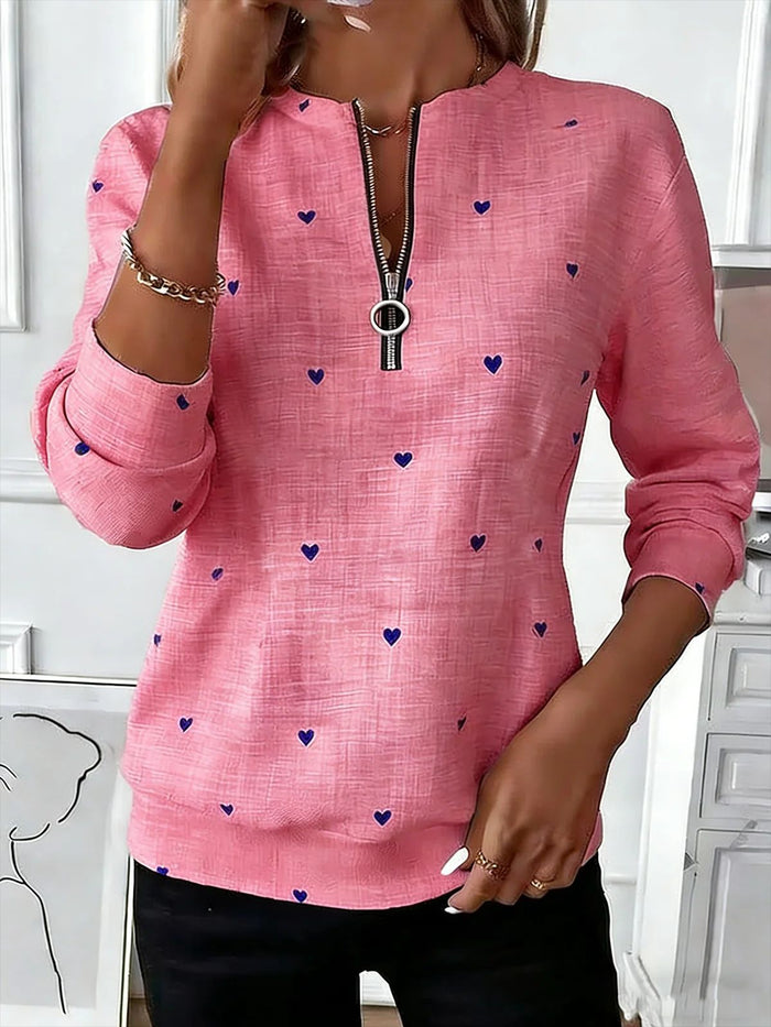Printed Christmas sweatshirt for women with long sleeves, loose fit and fleece construction shown for casual holiday styling.