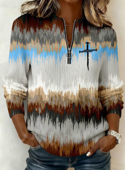 Printed Christmas sweatshirt for women with fleece construction, long sleeves and loose fit shown for winter holiday styling.