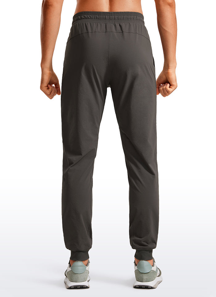 CRZ YOGA Men 31" Lightweight Water Resistant with Zip Pockets Joggers Arbor Olive