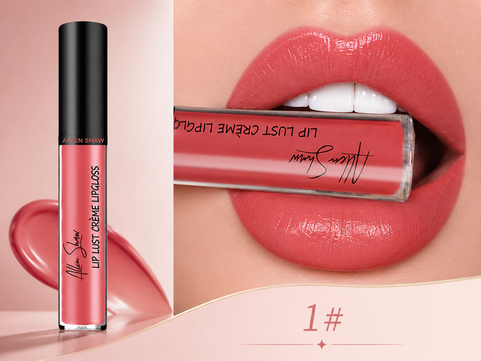 A close-up beauty listing showing an Alton Bahmy liquid lip gloss tube beside a model's lips wearing the shade. The lip gloss is a warm coral pink, labeled 'Lip Lust Crème Lipgloss' with the Alton Bahmy signature on the tube.