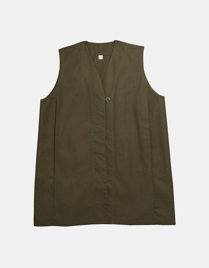 Minimalist olive green sleeveless vest featuring a clean V-neck design and a single button closure, crafted with high-quality fabric for timeless elegance.