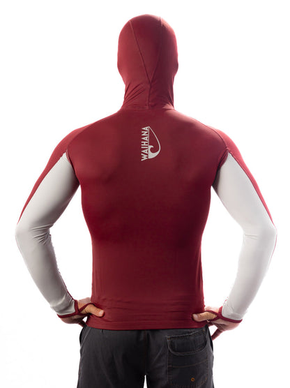 Back view of a male model wearing the Waihana Maroon Carvico Hooded Surf Rashguard with grey contrast sleeves and a full hood, shown against a white background.