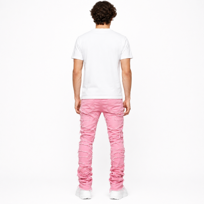 Person wearing a white t-shirt and pink jeans on a white background