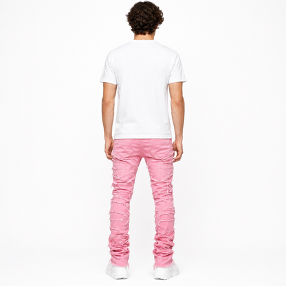 Person wearing a white t-shirt and pink jeans on a white background