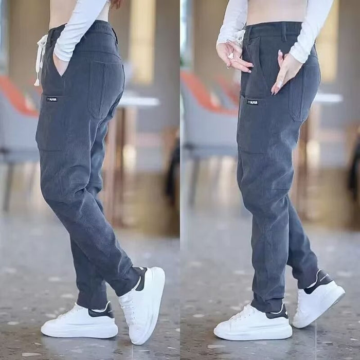 Khaki Men's 6-Pocket Track Sweatpants Paired with Sneakers – Mid-Waist Versatility in Motion