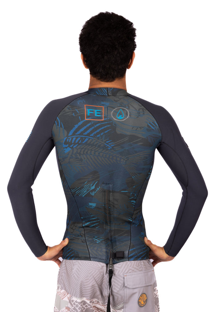 Back view of a male model wearing the Waihana Men's Field Ethos Rear-zip Surf Top in FE Blue, showing a dark fish-skeleton camouflage print, rear zip, and FE and Waihana logos on a white background.