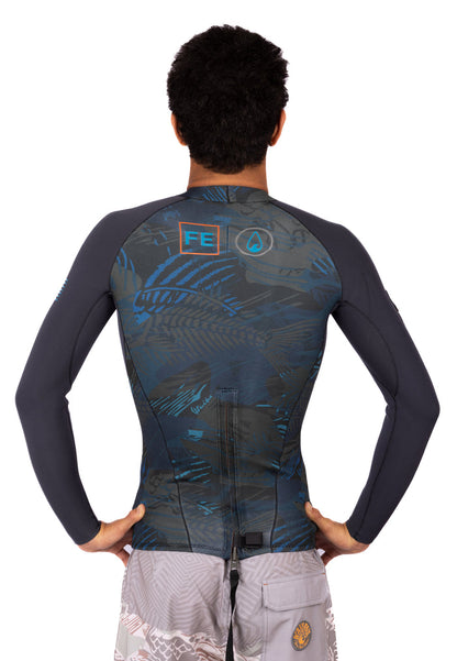 Back view of a male model wearing the Waihana Men's Field Ethos Rear-zip Surf Top in FE Blue, showing a dark fish-skeleton camouflage print, rear zip, and FE and Waihana logos on a white background.