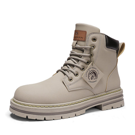 Gray men's ankle boots with rugged rubber sole and stitched upper side view
