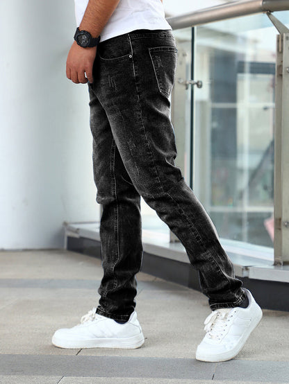 Men’s Stretch Skinny Jeans – Fabric stretch test showing mobility