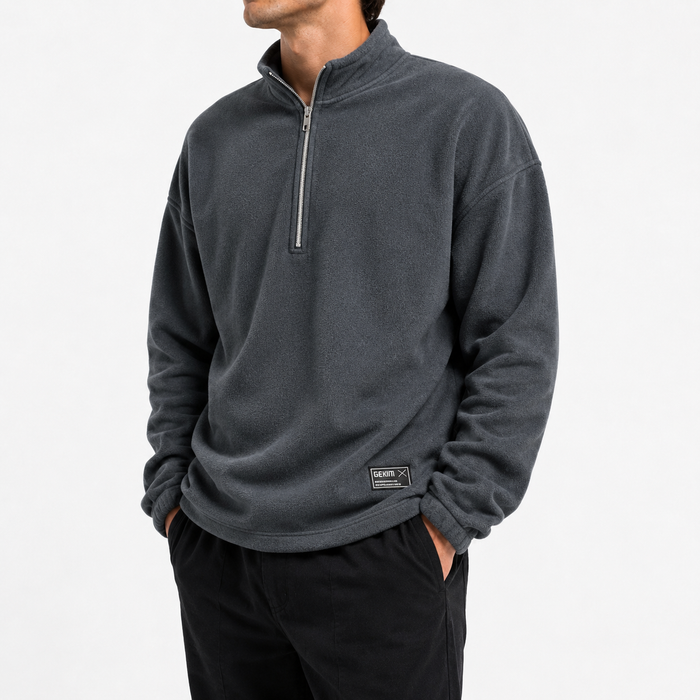 Men's fleece half zip sweatshirt dark gray loose fit hero image on male model