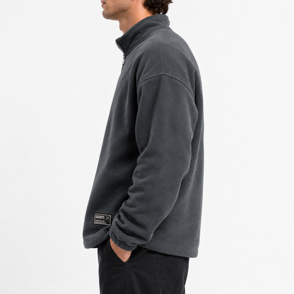 Men's fleece half zip sweatshirt dark gray side fit view on male model