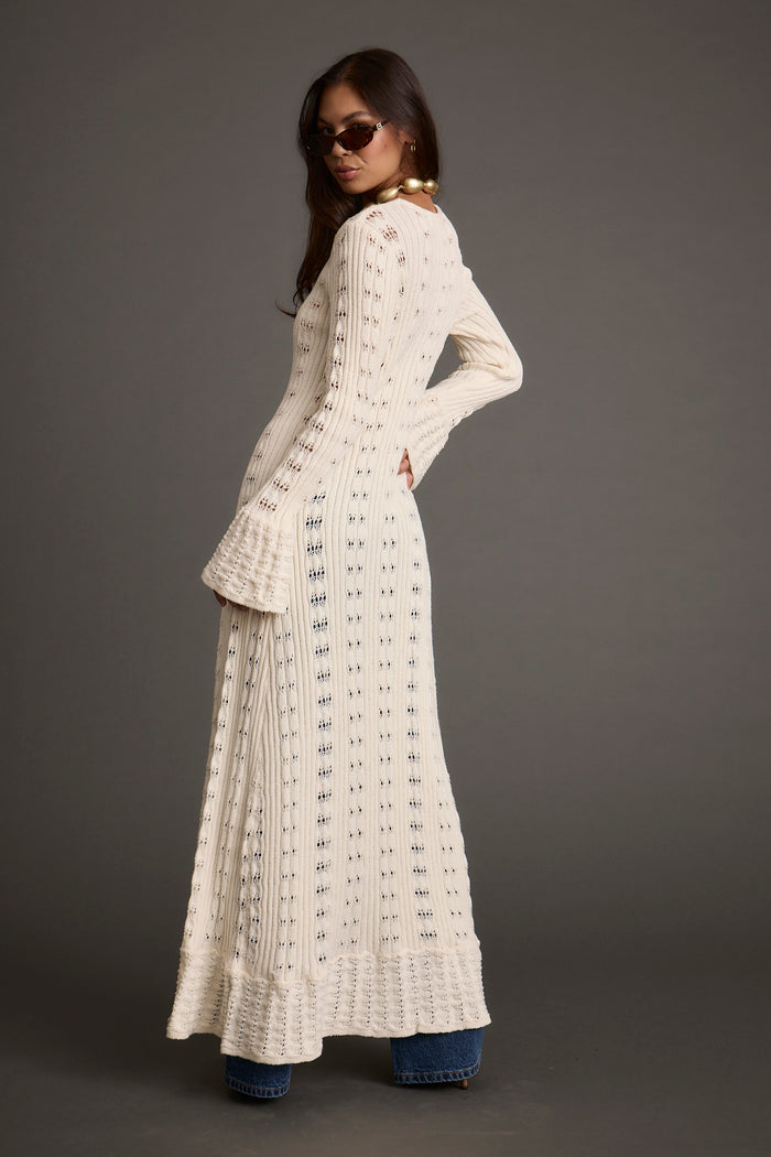 Additional view of the Nicoletta Cream Knit Longline Top from a different perspective.