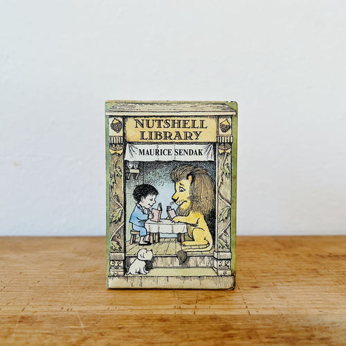 A miniature book set titled 'Nutshell Library' by Maurice Sendak, featuring illustrations on the covers.