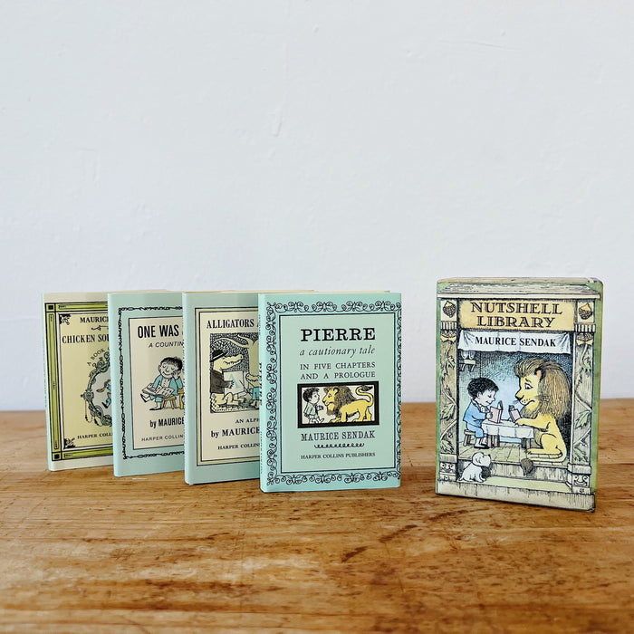 A miniature book box set titled 'Nutshell Library' by Maurice Sendak, with the four titles included in the set displayed next to the box.