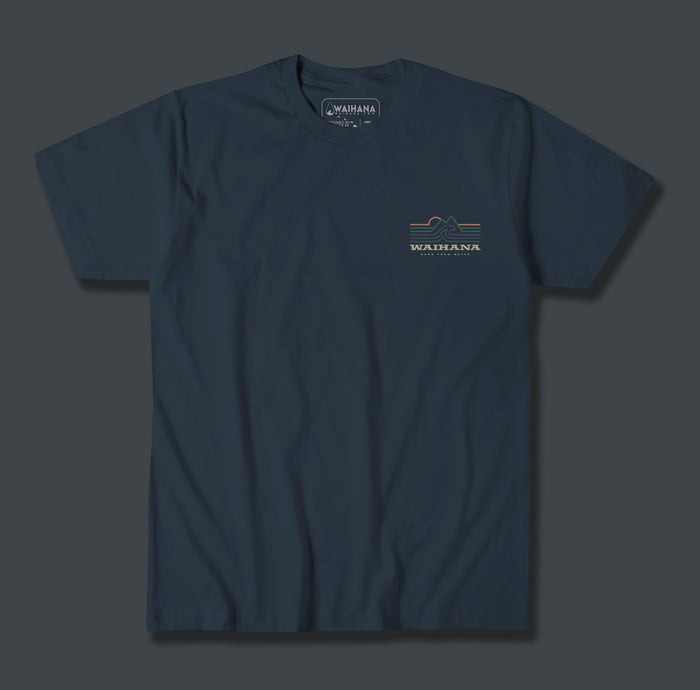 Waihana Ocean Elements Premium Pima T-Shirt in Abyss Blue displayed flat, featuring a small retro-style chest graphic with waves, mountains, and the Waihana brand name.