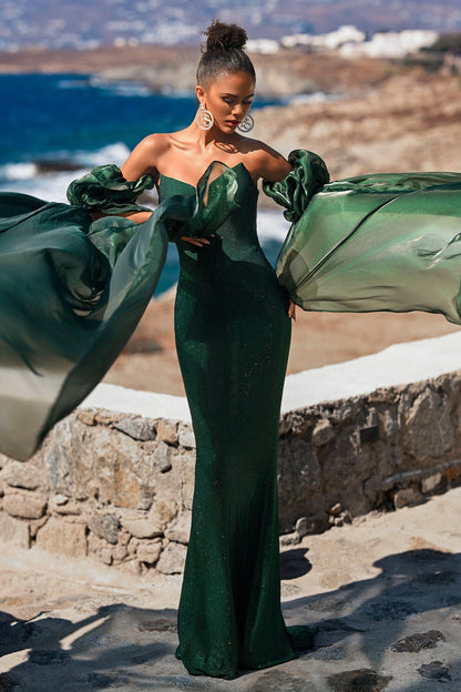 PS26010SL Emerald gown, woman posing near the sea.