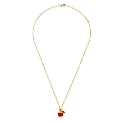 Gold necklace with a red apple pendant on a white background