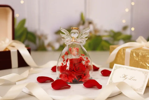 Rose gift box with angel glass dome and decorative rose arrangement shown from front for a clear view of the keepsake design.