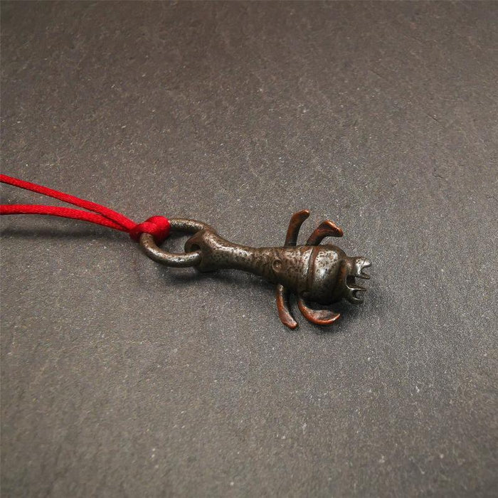 Scorpion Guru Amulet 1.26" - Tibetan Buddhist amulet, close-up detail