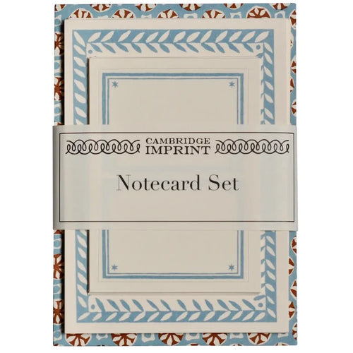 Cambridge Imprent notecard set in a decorative envelope-style packaging with blue and brown patterned borders and a central white label reading 'CAMBRIDGE IMPRINT Notecard Set'.