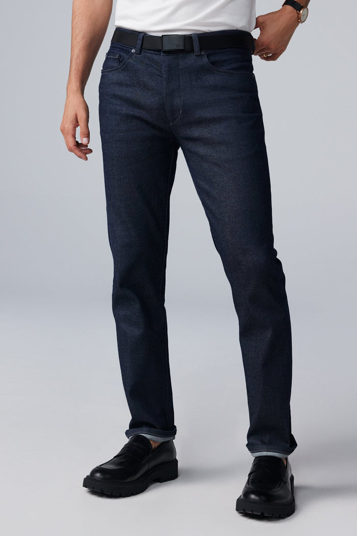 Front view of man wearing SILVER Denim in Dark Indigo Rinse