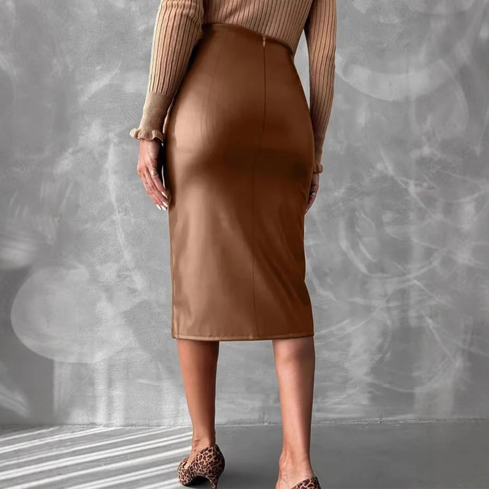 Side view of camel high waist leather skirt revealing hip split detail, emphasizing movement and modern edge in this slimming PU essential.