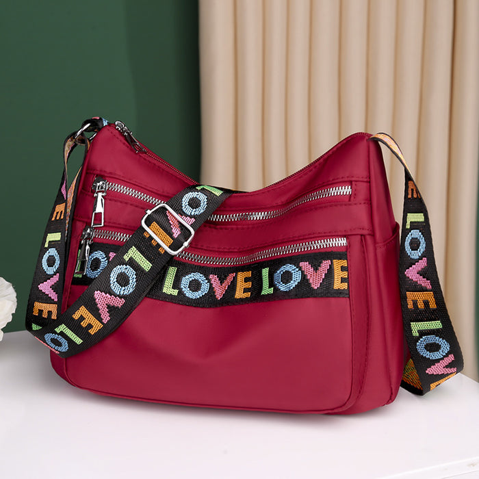 Eye-Catching Red Oxford Cloth Crossbody Bag: Soft Fabric with Trendy Accents