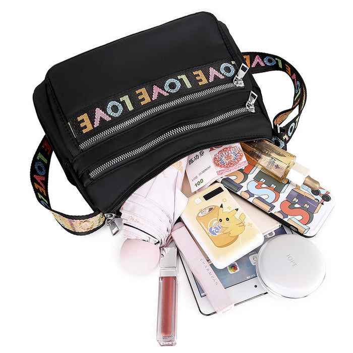 Everyday Black Oxford Cloth Crossbody Bag: Large Capacity and Secure Pockets