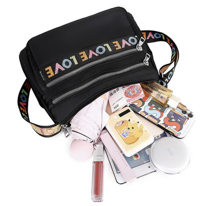 Everyday Black Oxford Cloth Crossbody Bag: Large Capacity and Secure Pockets