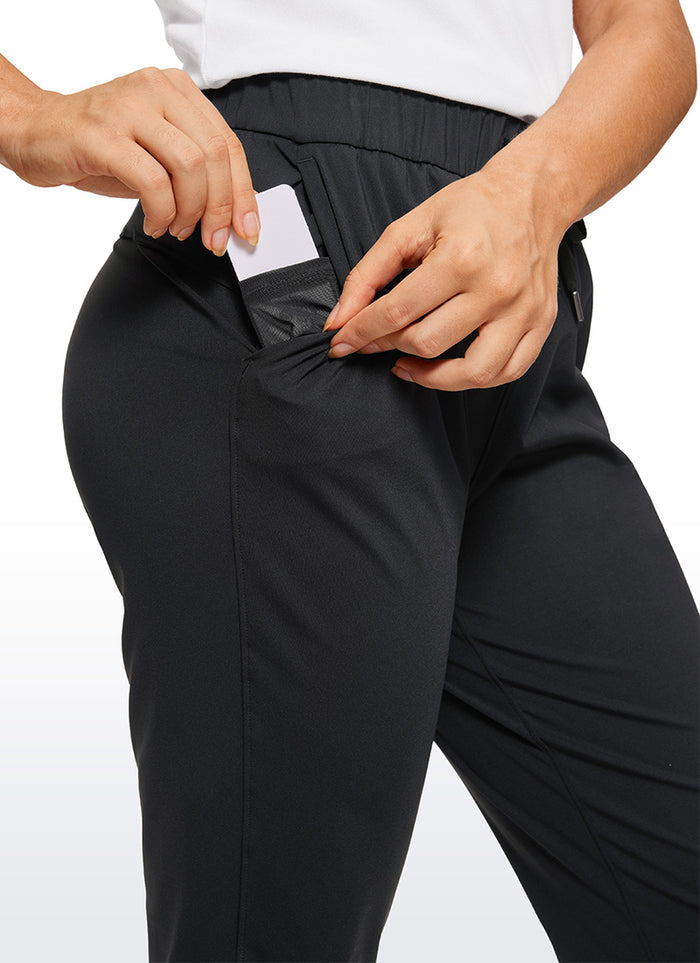 CRZ YOGA Women's Travel Slim Fit Stretch Drawstring Long Pants 31'' Black