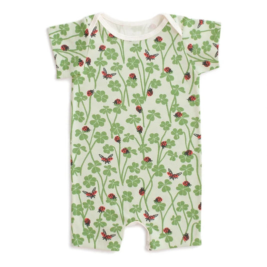 Baby romper with nature-themed print on a white background