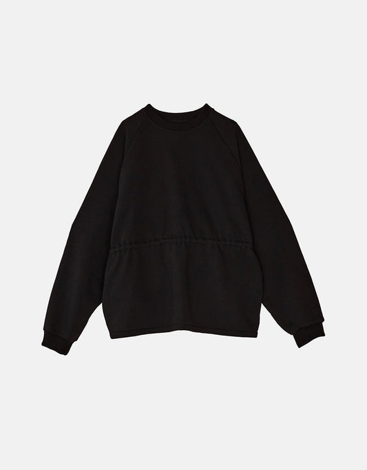 Minimalist black sweatshirt with subtle stitching detail at the waist, featuring a relaxed fit and clean lines designed for understated elegance and comfort.